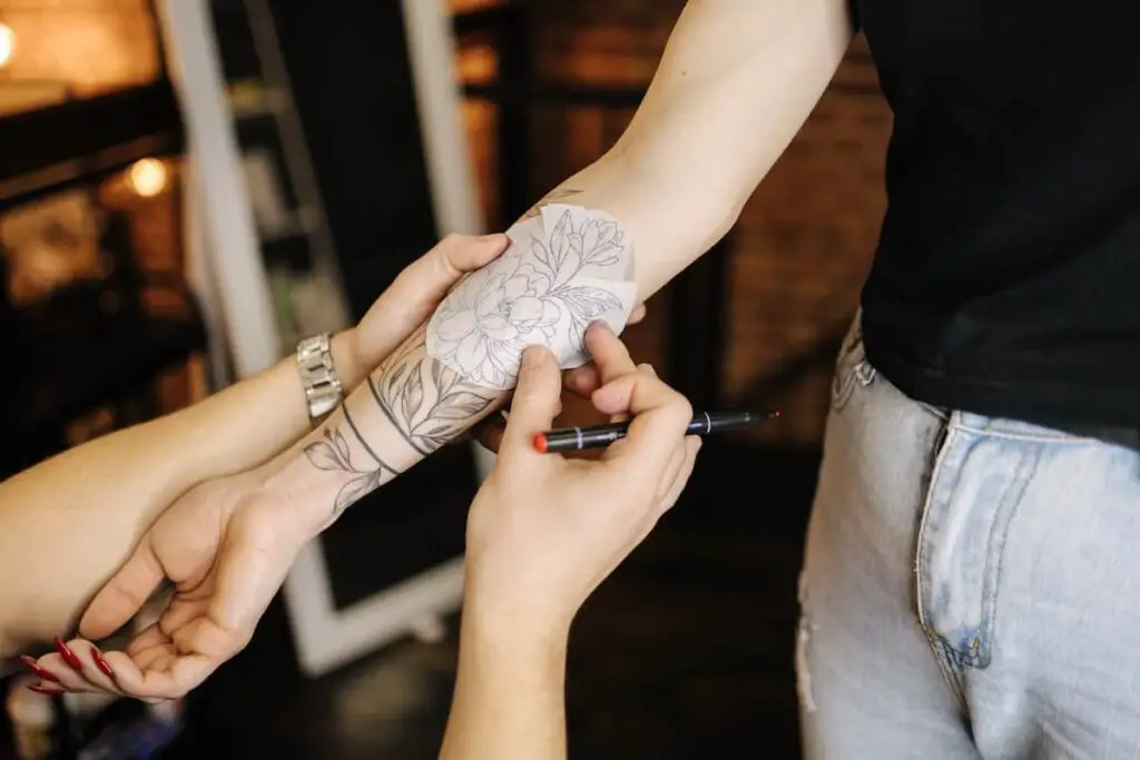 Close-up of a fine line tattoo on the inner wrist showing delicate details