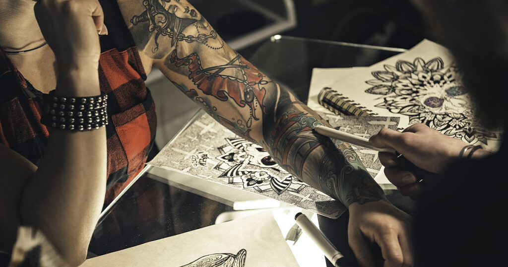 Close-up of a tattoo scab peeling off naturally without picking.