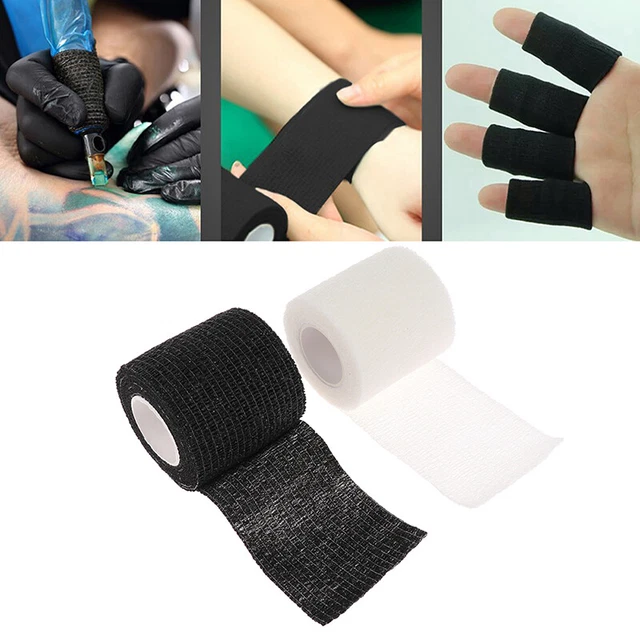 Tattoo peeling with skin flakes on black ink area