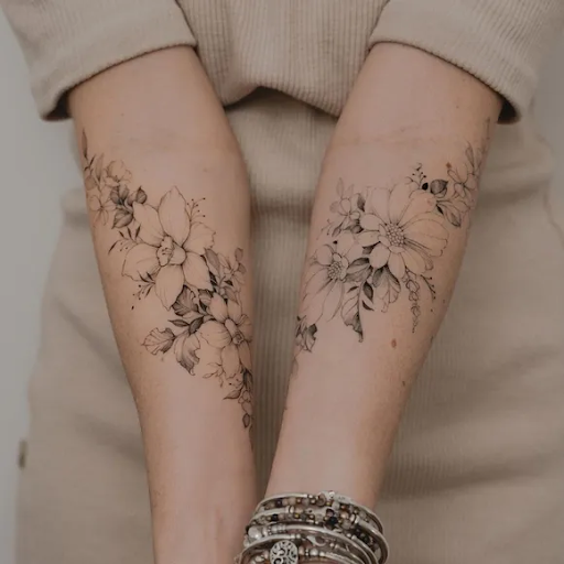 Applying fragrance-free moisturizer to healing tattoo