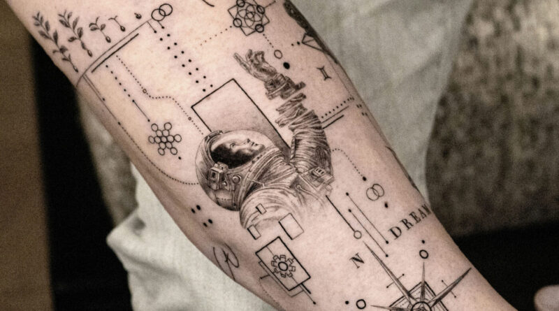 Tattoo artist sketching a fine line design on paper with a fine-tipped pen