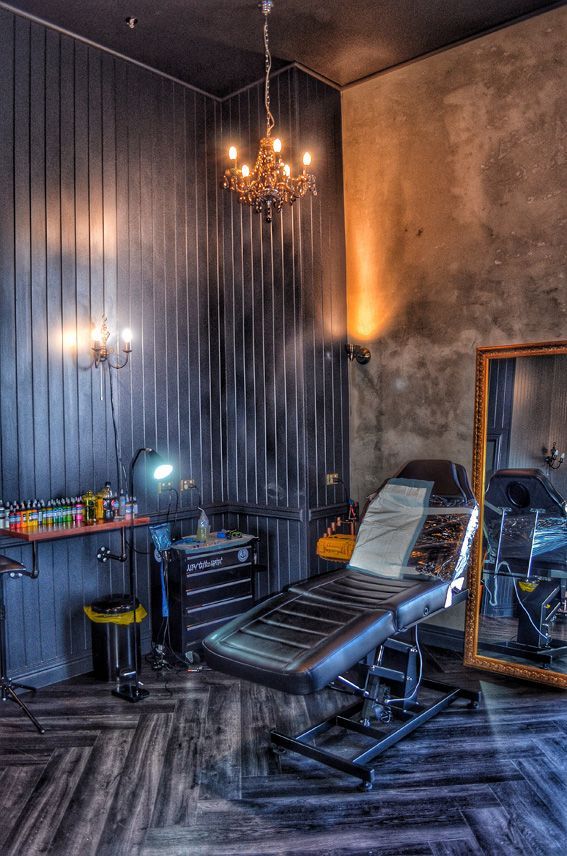 The storefront of a tattoo studio on a street in Ho Chi Minh City.