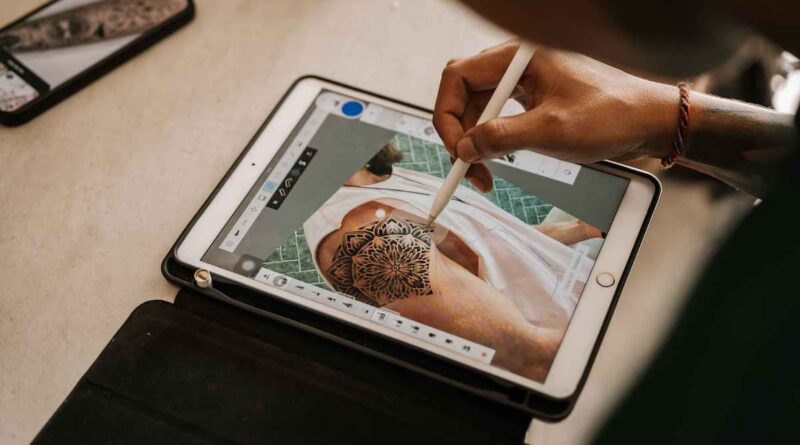 Screenshot of a verified tattoo convention website with contact details