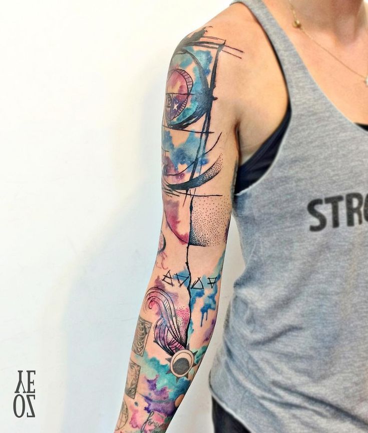 Applying SPF 50 sunscreen to a watercolor tattoo to prevent fading.