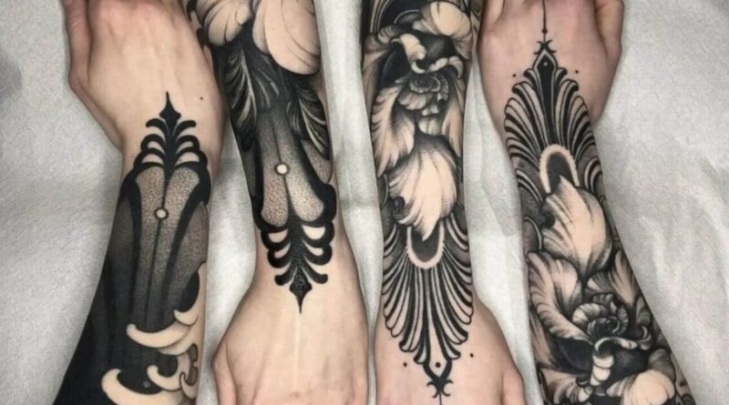Graphic tattoo sleeve with collage composition and strong contrast