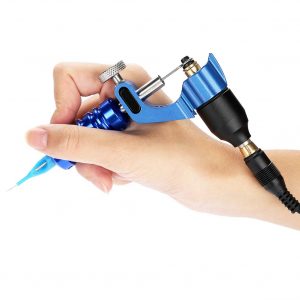 Tattoo machine power supply unit showing voltage and frequency settings