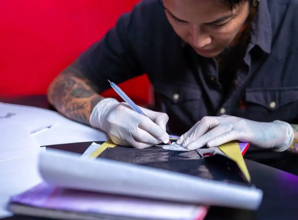 Review the studio's price list to understand costs for different tattoo sizes and styles.