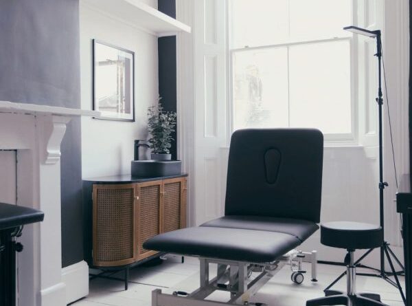 Reception area of a tattoo studio in Hanoi with artwork display