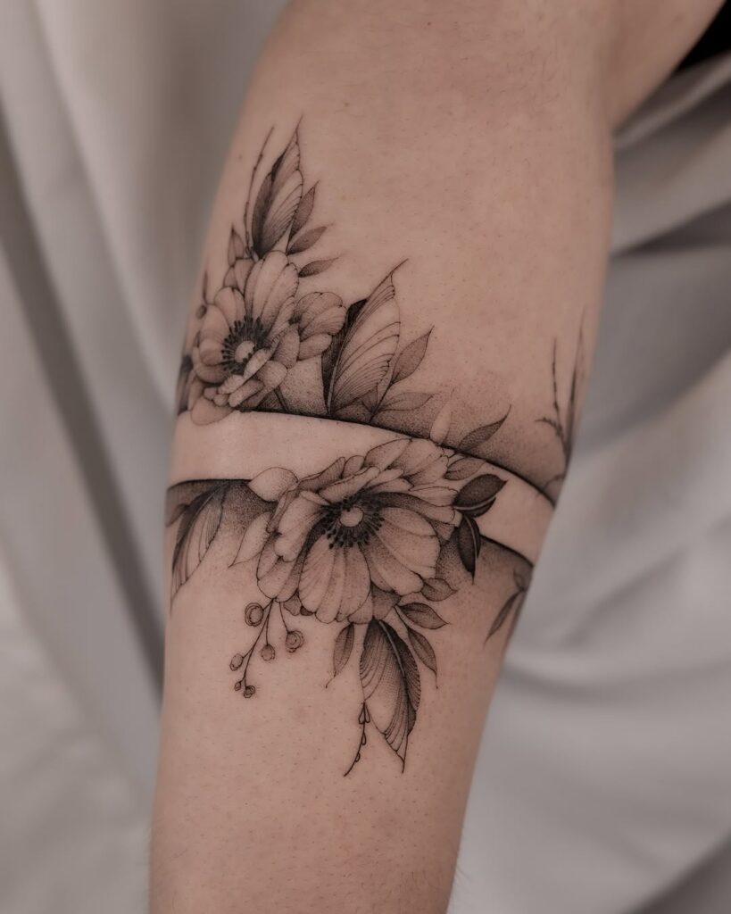 Fresh tattoo covered with aftercare film wrap