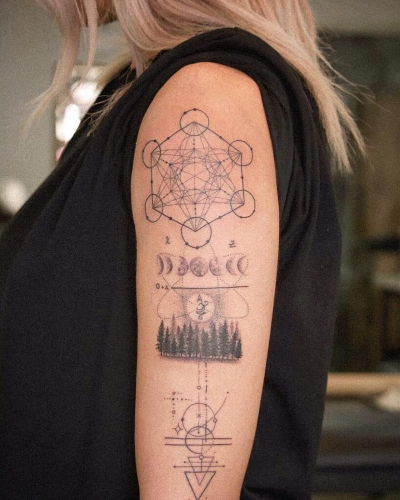 Fresh geometric tattoo covered with aftercare film to protect during healing.