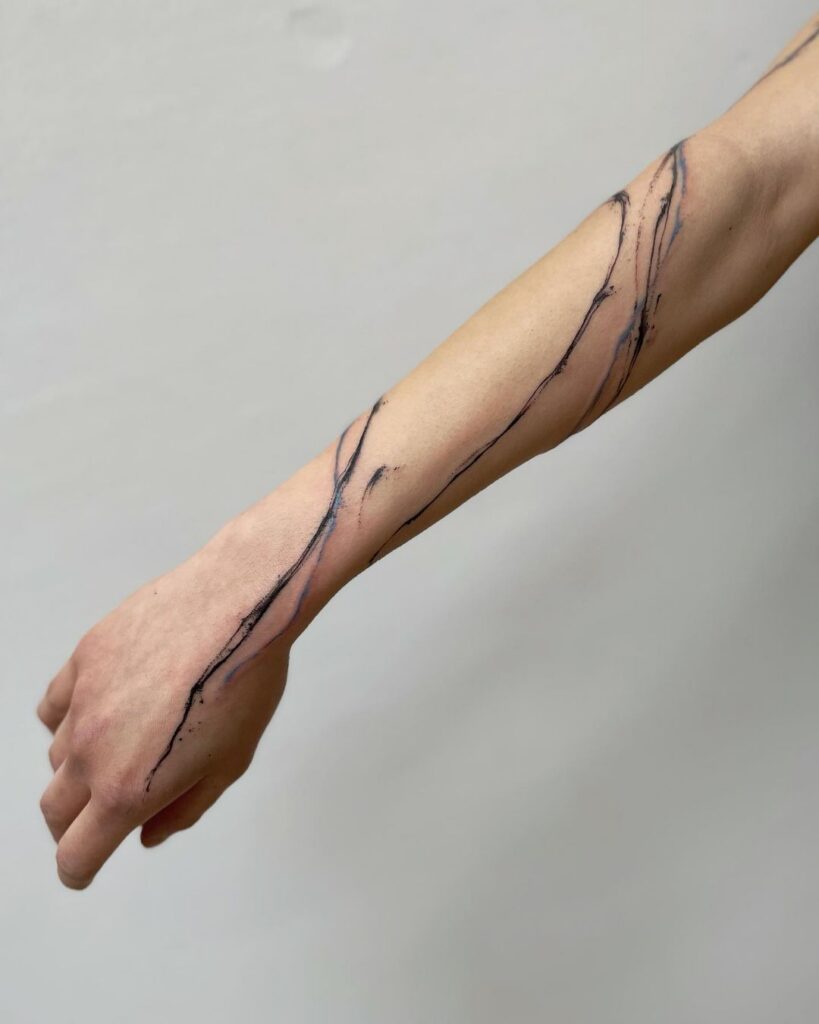 Fresh tattoo covered with transparent aftercare film wrap