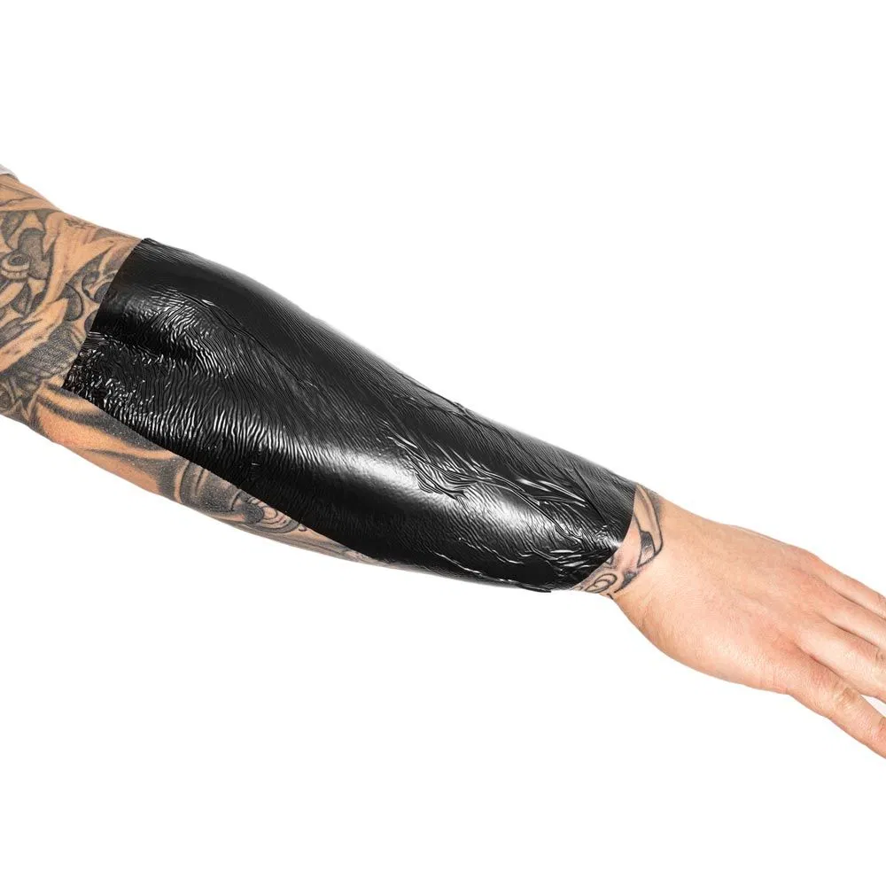 Delicate fine line black and grey tattoo on the wrist