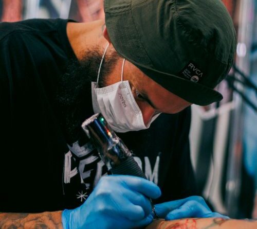 A tattoo studio in Hoi An blends modern hygiene with local charm.