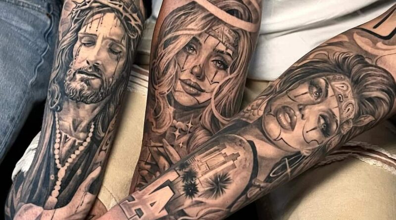A healed Chicano sleeve under natural light shows how black-and-grey settles over time.