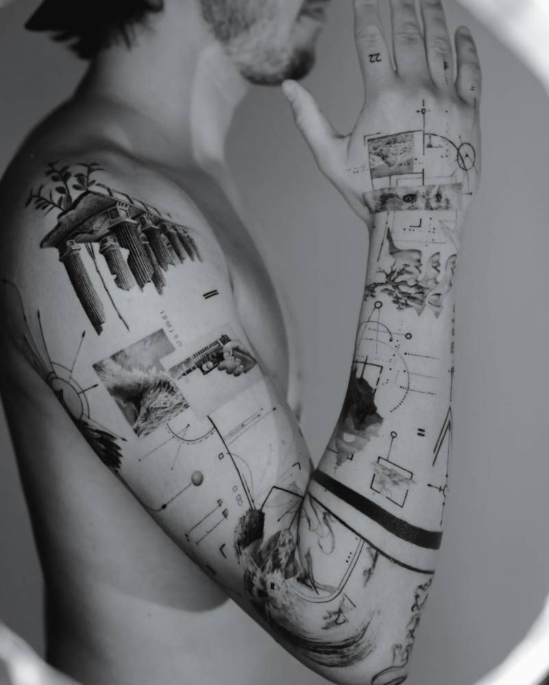 Graphic tattoo full arm với biểu tượng, chữ và nhịp thị giác