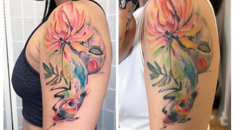 A healed watercolor tattoo on the forearm, reviewed in person.